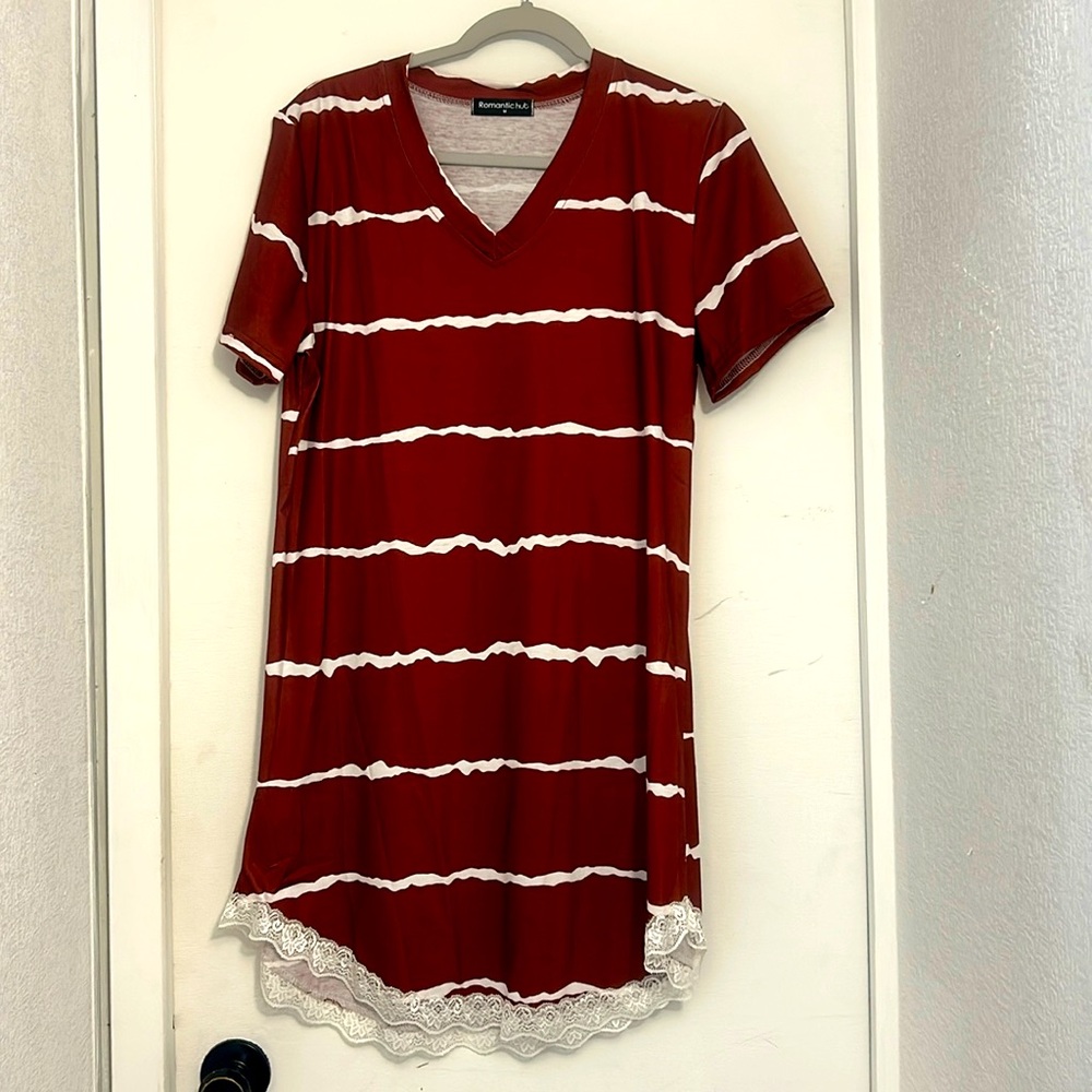 T-shirt style burgundy/white with lace trim on the bottom edge